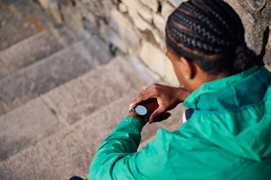 Black Man Checking Smartwatch 