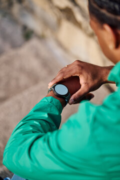 Black Man Checking Smartwatch 