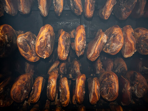 Traditional Njegusi prsut smoking in a Montenegro smokehouse