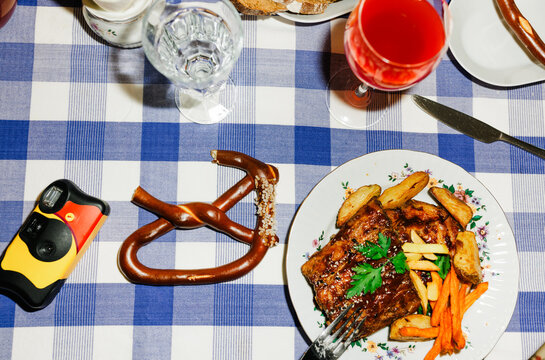Lunch With Food and Drinks on a Table With Blue Checkered Cloth