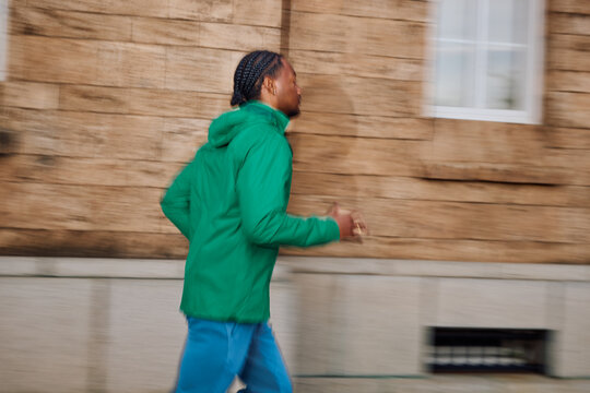 Black Man Jogging/Training Outdoors. Runner.