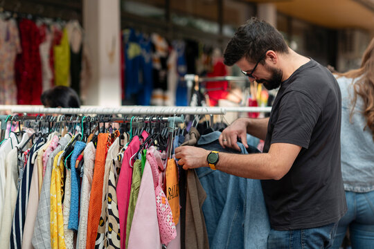 Man Shopping at a Second Hand Market