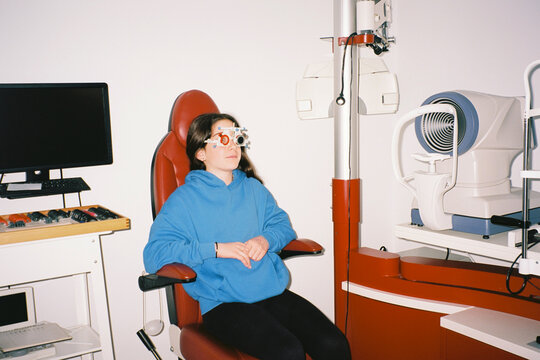 Girl in eye exam room
