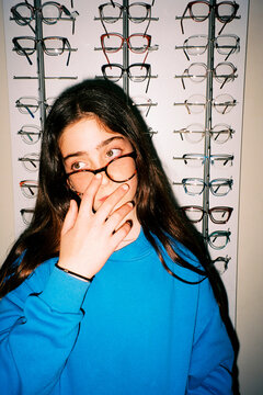 cute Girl adjusting glasses