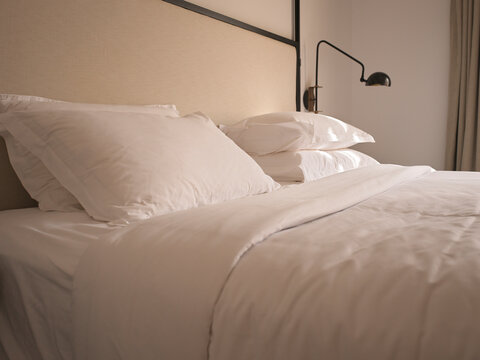 Soft Bedding on a Neatly Made Bed