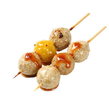 Delicious meatballs on skewers with a savory sauce, a perfect street food snack or appetizer option for any occasion