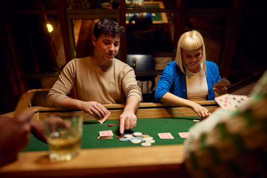 Friends Play Poker at night