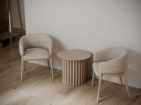 Closeup to living cozy ivory chairs. Lounge space with coffee table