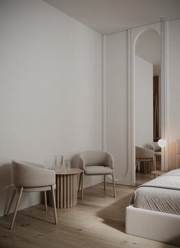 Cozy space with coffee table and accent wall arch mirror. Hotel room