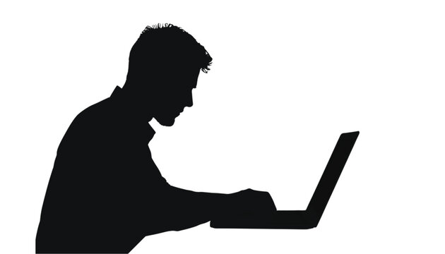 Businessman silhouette types diligently on a laptop while working in a bright office environment.