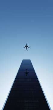 A jet flying above a scyscraper 