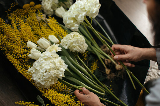assorted white and yellow flowers