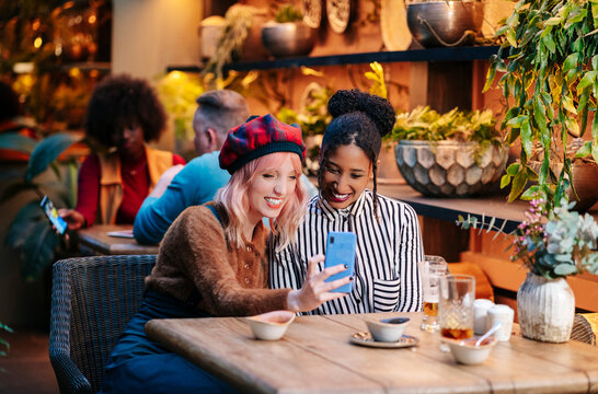 Diverse friends enjoying time together at a restaurant