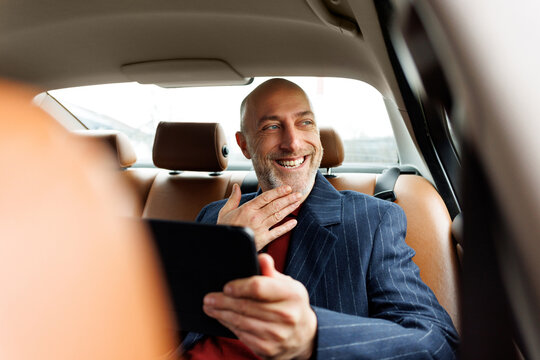 Grinning car rider