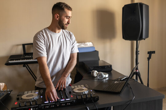 DJ mixing music in his home studio