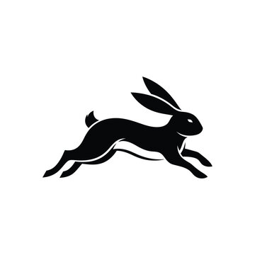 Black silhouette of a rabbit leaping forward with long ears