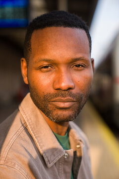 Man Portrait on Train Platform During Sunset 