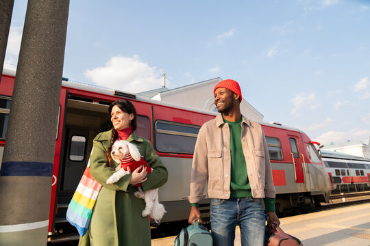 Couple With Dog at Train Station in Daylight
