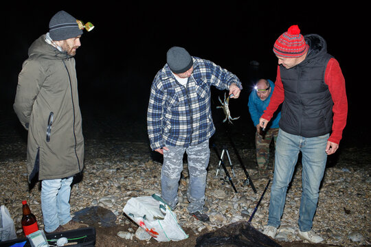 Fishermen on a night fishing trip