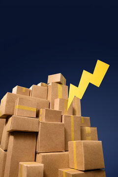 Pile of cardboard boxes with a yellow lightning bolt