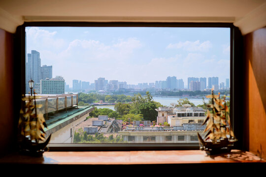 View of Guangzhou Skyline and River From a Building Window