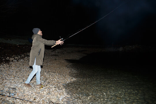 Angler catches crabs at night