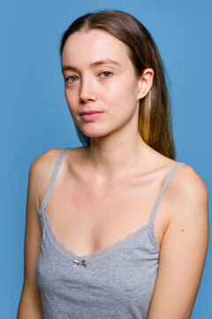 Woman Posing Against Blue