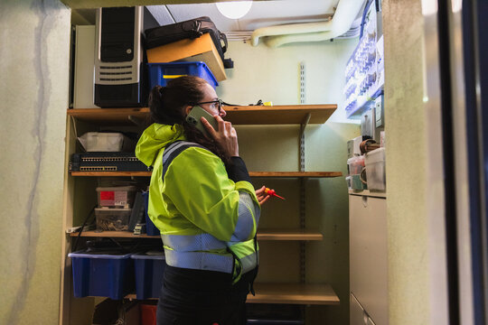 Technician Providing Remote Support and Diagnostics via Smartphone