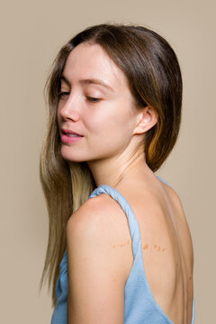 Woman Posing In Profile