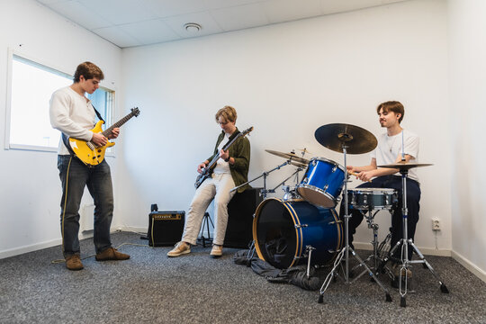 Band of Friends Rehearsing Music in Studio