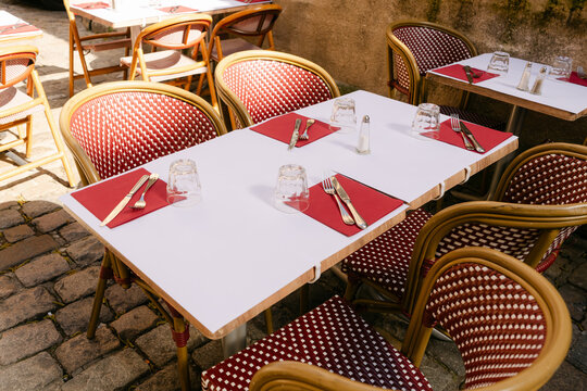 restaurant with tables and Caf&eacute; chairs in Lyon France, 