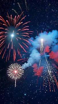 Red white and blue fireworks exploding in the night sky