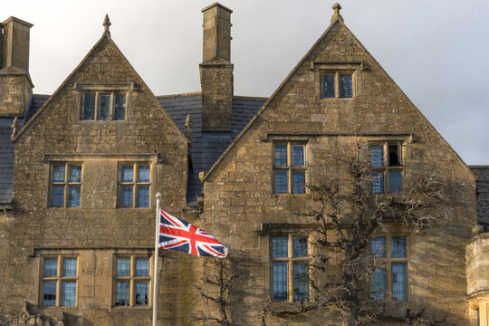 Union Jack flag flying outside a Cotswolds village