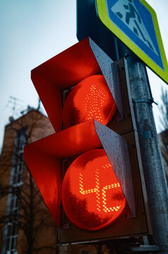 Traffic Light Shows Red Signal for Walking in City Area