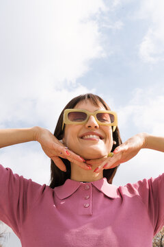 Spring lifestyle scene featuring young person enjoying bright day