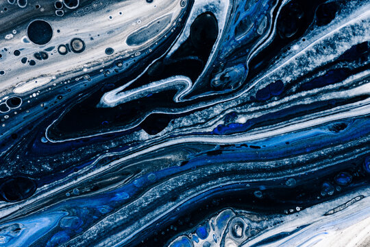 Abstract background with deep blue and black marble texture