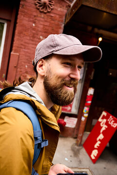 Laid-back guy walking in Brooklyn
