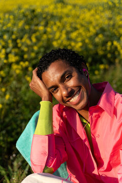 Happy man t in a Yellow Flower Field