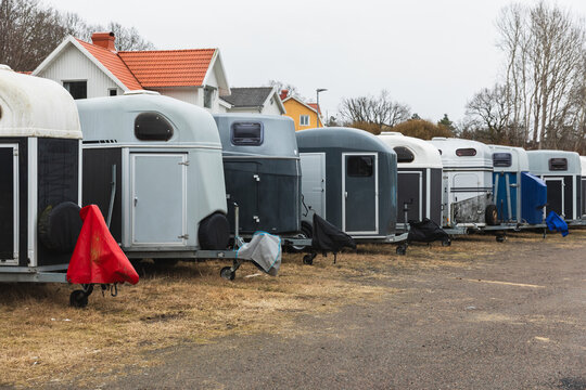 Row of Professional Horse Trailers Parked at an Equestrian Facility