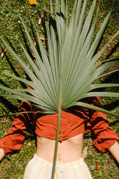 Anonymous Summer Portrait with Tropical Palm Leaf