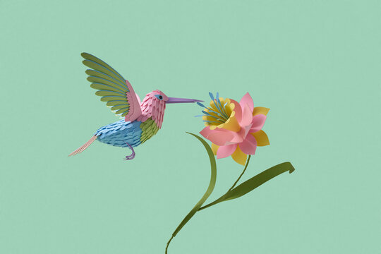 Paper hummingbird sipping flower on mint background