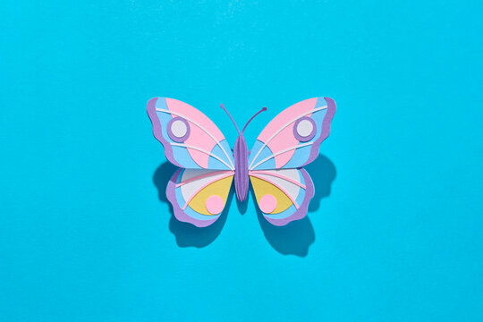 Paper spring craft butterfly on lavender shadow