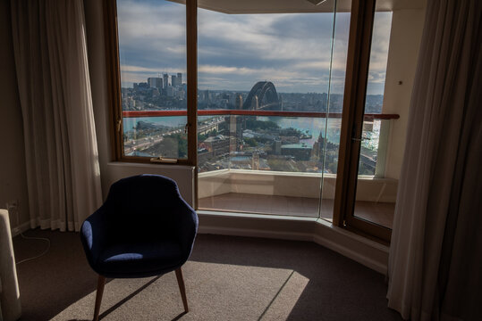 Hotel lounge room with view of Sydney Harbour.