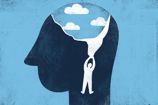 Human head with a small silhouette of a man painting blue sky