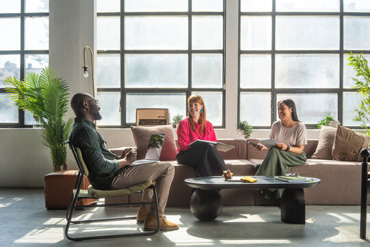 Business Team Meeting in a Modern Office Lounge 