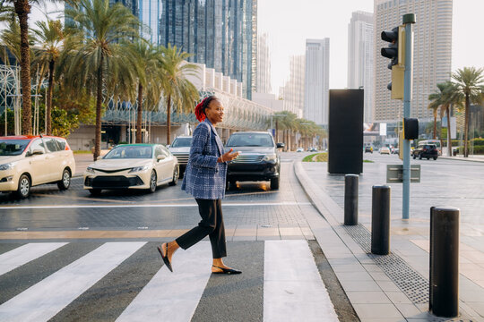 A woman using a mobile phone in the city