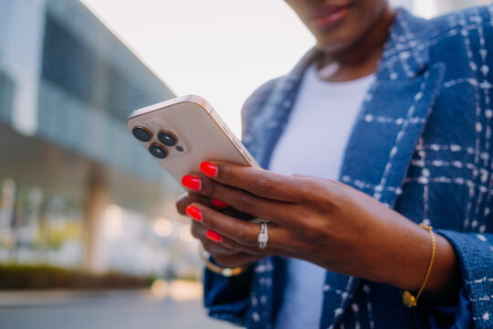 A woman using a mobile phone in the city