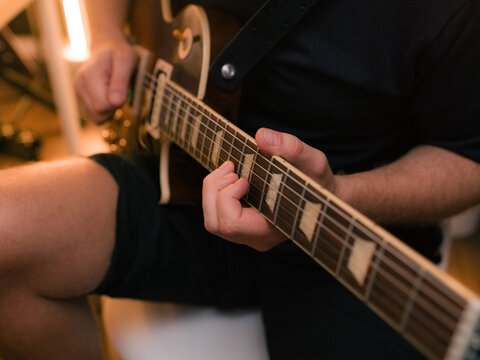 Artist playing guitar