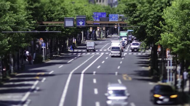 A timelapse of miniature traffic jam at the downtown street in Tokyo zoom