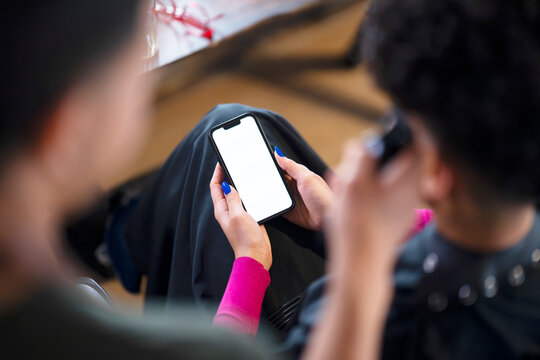 Using Smartphone in Barbershop
